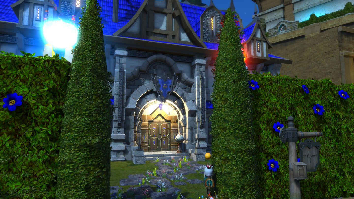 A hedge-rimmed building of museumesque stature